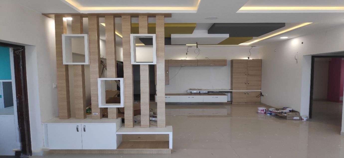 Living Room with Wooden Partition — living room interior design in Chennai